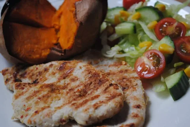 Lime, garlic and chilli chicken with baked sweet potato